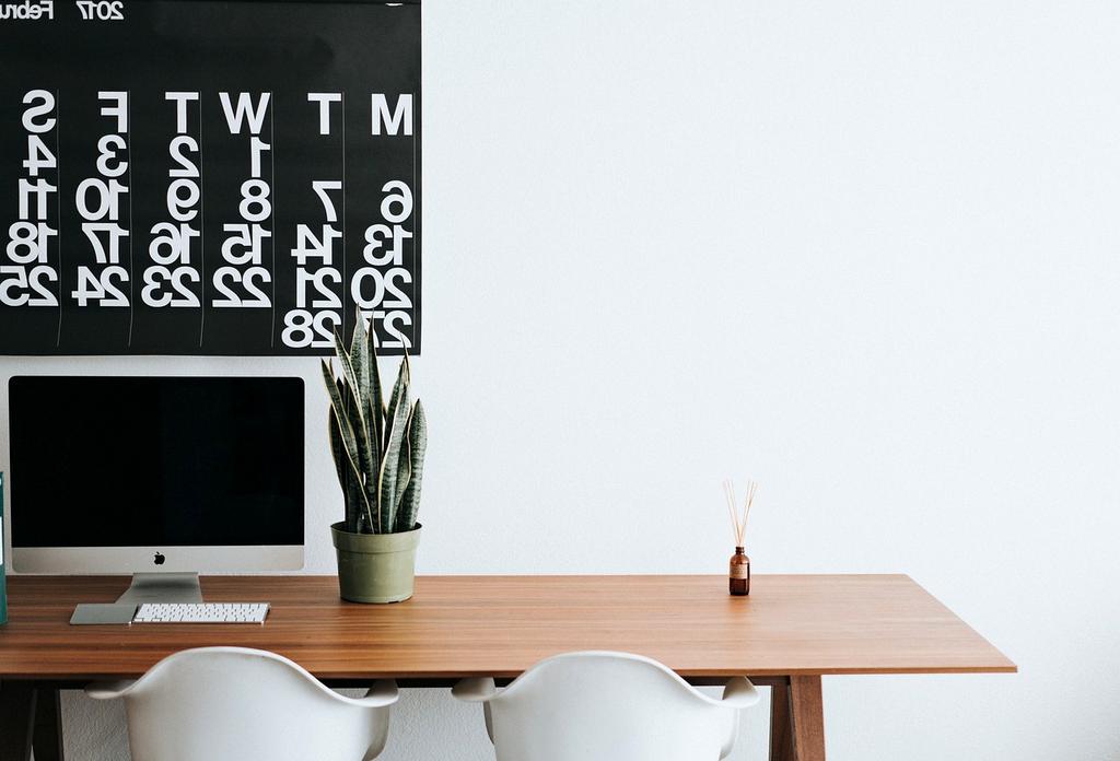A technician calibrating a high-end monitor